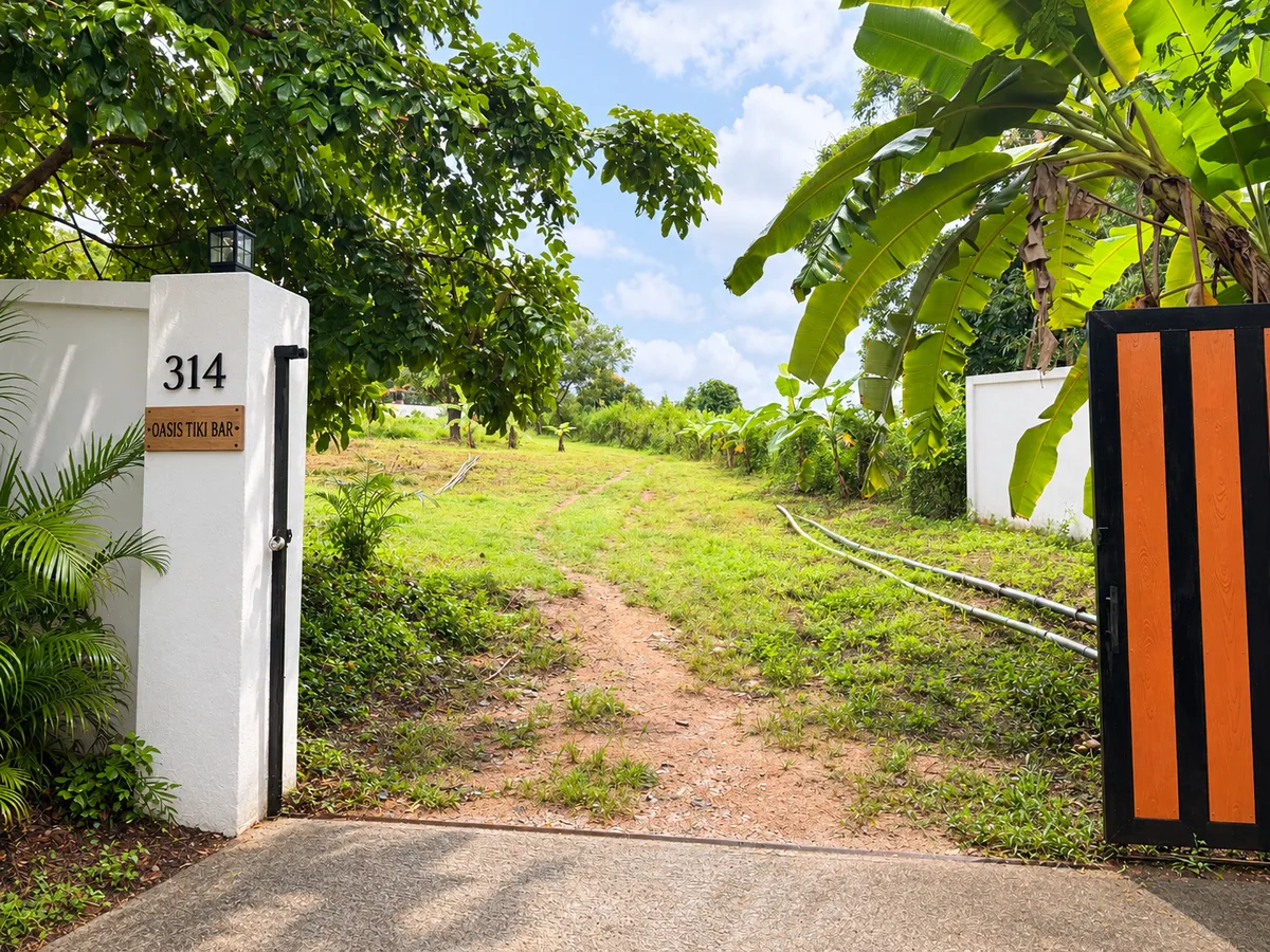 The entrance path and gate to Bungalows & Bunks in Pai.